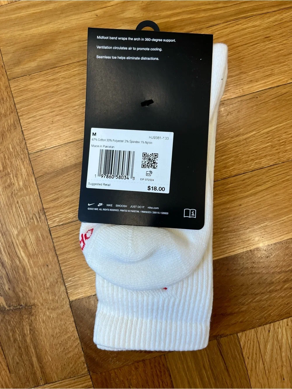 Nike White Crew Socks with Pink and Red Swoosh Accent